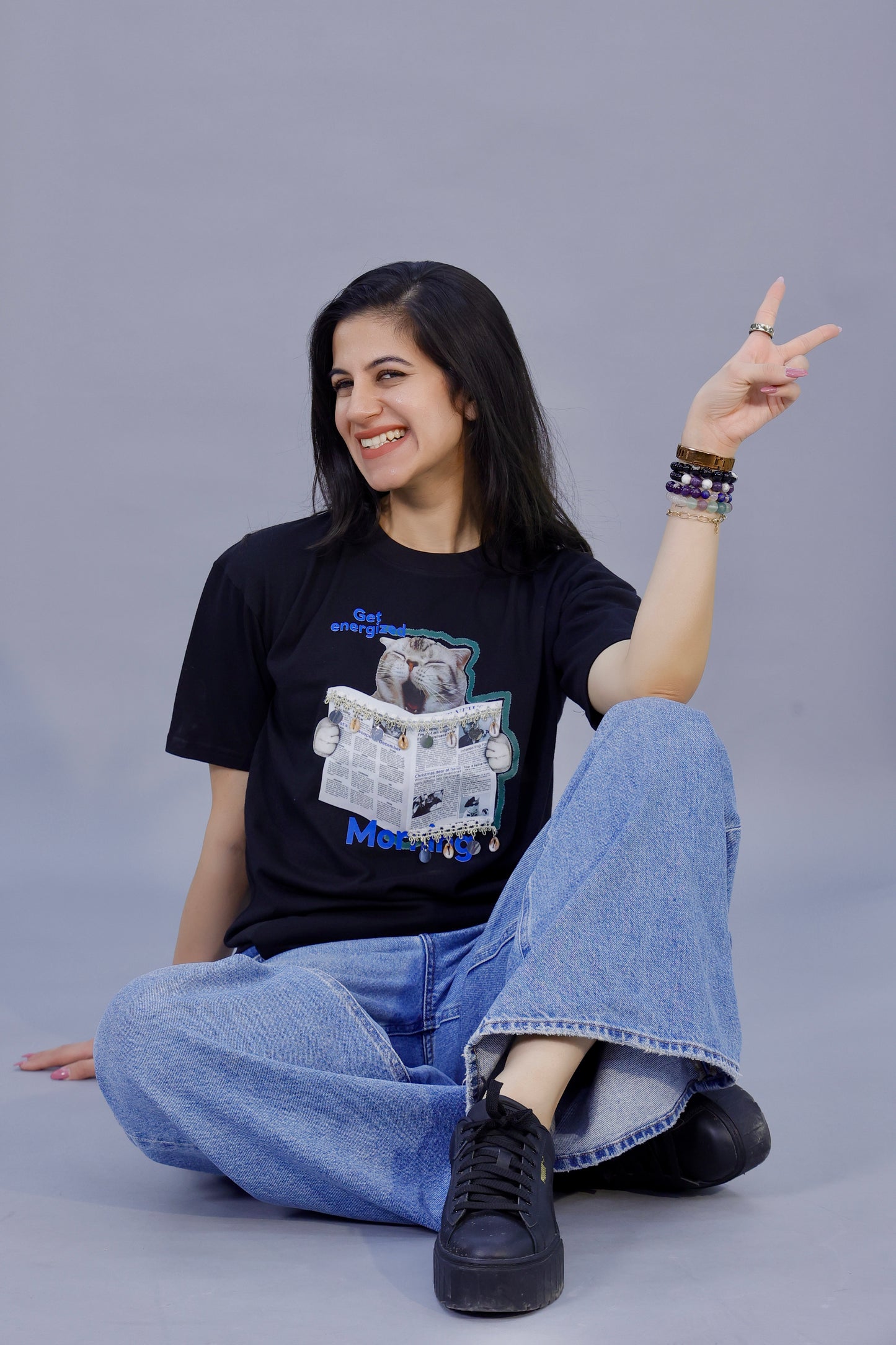 Energized Cat Newspaper Graphic T-Shirt